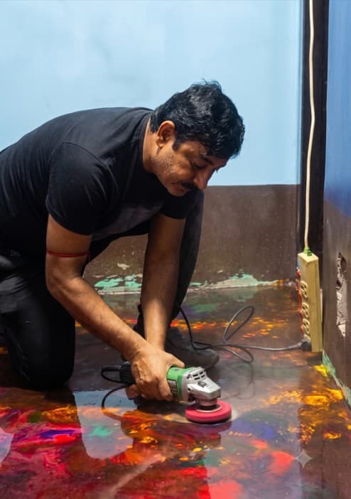 Founder in the Fauji Resin workshop